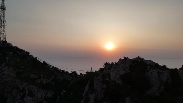 Cinematic Sunrise Over Dalian Mountains &ndash; Golden Light and Coastal Landscape from Above