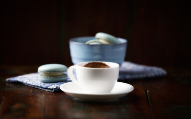 Fototapeta premium Cup of coffee on rustic wooden background. Soft focus. Copy space