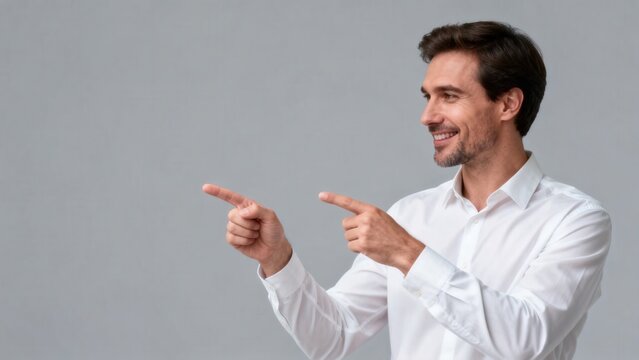 Man in white shirt pointing with both hands
