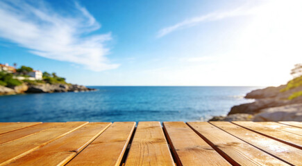 Fototapeta premium Sunny coastal view from wooden deck overlooking blue ocean