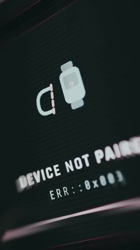 Unpaired device warning shown with animated icon