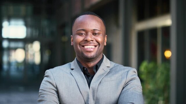 Real estate, man or face with smile in city for urban property inspection, building leasing or pride. Rental agent, black person and happy outdoor for commercial scouting, experience and confidence