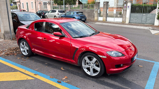 The Mazda RX-8, a sports coupe famous for its Wankel rotary engine, features a four-seater coupe body style. Udine, Italy, June 5, 2026