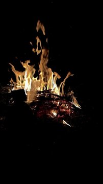 Nighttime Camping Concept with Blazing Campfire