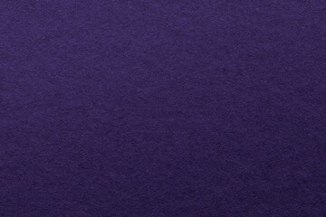 Close-up of a textured purple fabric surface, showing fine details. © Rawpixel.com