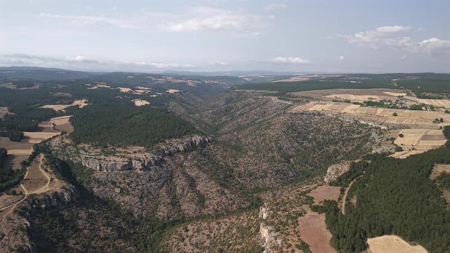 4K 10-bit top-down drone shot flying forward over the deep rocky abyss of Tokatli Canyon in Safranbolu, Turkey