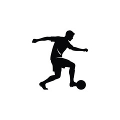 Obraz premium Silhouette of a soccer player skillfully dribbling the ball, demonstrating precise footwork and control during a dynamic moment in the game.