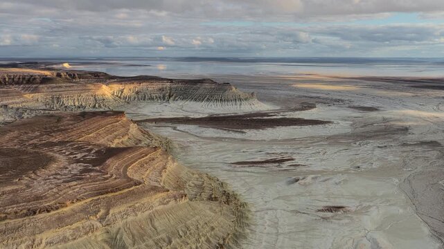 Aerial view of Bozjyra tract with white chalk cliffs and vast plateaus in Aktau, Mangystau Region, Kazakhstan.