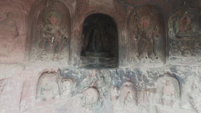 Buddhist fertility shrine carved in rock, Shizhongshan Grottoes, Shibao Shan, China Yunnan province