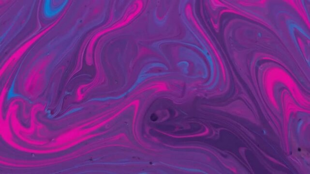 Vibrant purple and pink fluid art background.