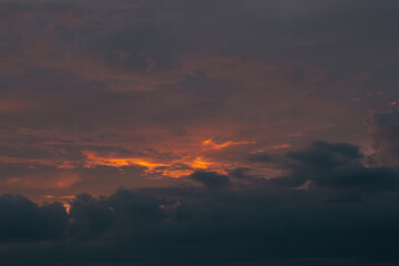 Obraz premium Dramatic Sunset Sky with Fiery Clouds