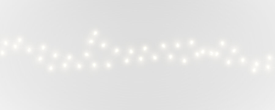PNG Christmas lights with sparkling glow effect. Transparent background clipart. Ideal festive element for banners posters and ads.