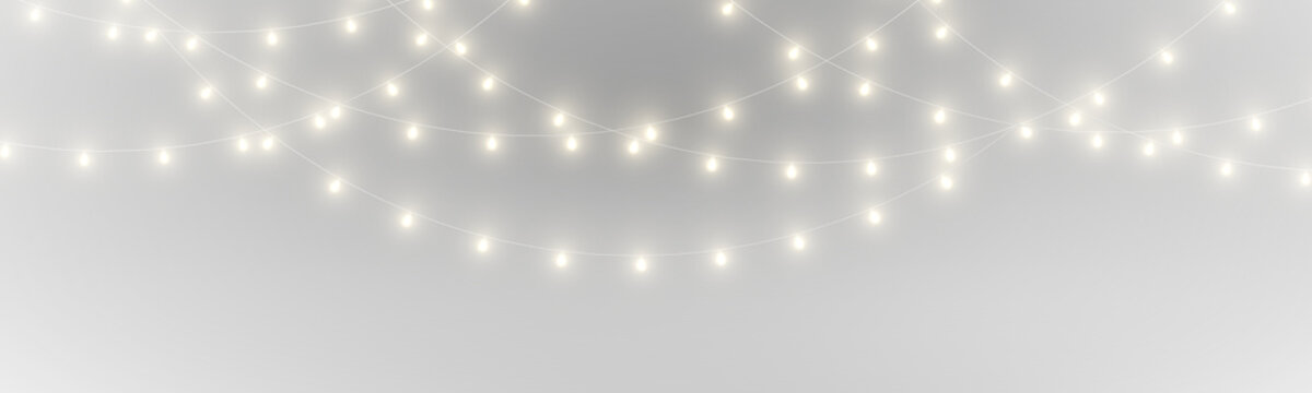 PNG. Golden Christmas lights string with sparkling glow. Elegant decoration for luxury holiday themes. Works well for posters and cards.