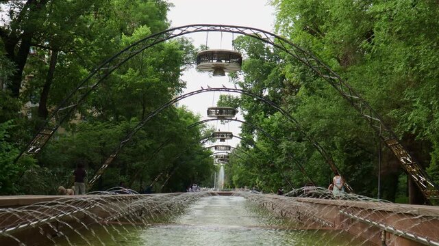 Almaty City Timelapse video. Almaty City Kazakhstan 9 May 2026. Baiseitova street. The Nedelka Fountain designed and developed by M.K. Safin in 1972, Fountain "Week"