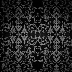 Obraz premium Black and gray baroque damask pattern with intricate floral scrolls. Dramatic vintage wallpaper design for luxury backgrounds, textiles and gothic decor themes.
