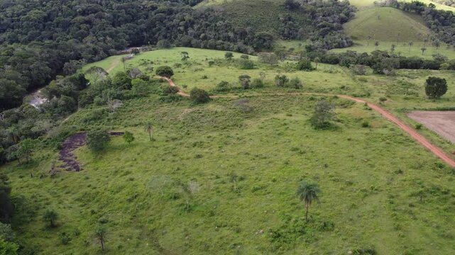 Aerial views of the towering cliffs and escarpments of Serra da Canastra, Brazil, showcasing dramatic rock formations, vast plateaus, rugged landscapes, and the untouched beauty of the Brazilian highl