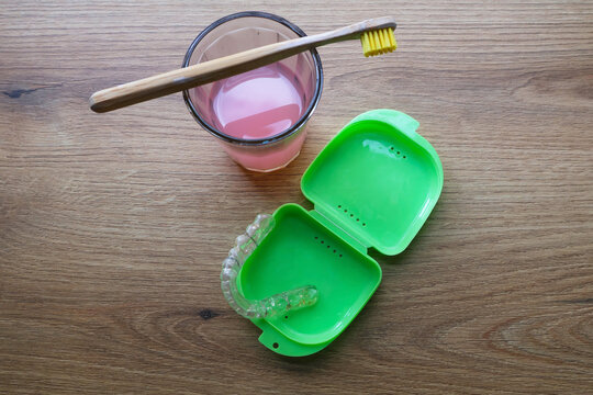 Photo of a dental mouth guard. Treatment with a splint. Health and medicine. Bruxism prevention. Teeth protection and alignment. Jaw pain. Dentistry and orthodontics. Teeth grinding.