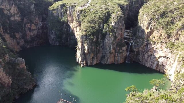 Aerial views of the Capit&oacute;lio Canyons in Minas Gerais, Brazil, showcasing dramatic rock cliffs, emerald waters of Furnas Lake, breathtaking landscapes, and one of the country's most iconic natural att