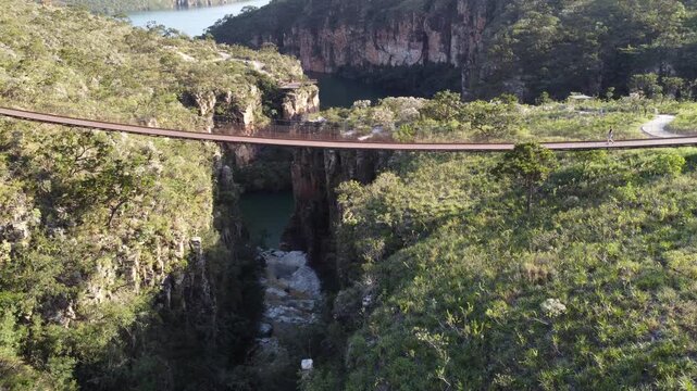 Aerial views of the Capit&oacute;lio Canyons in Minas Gerais, Brazil, showcasing dramatic rock cliffs, emerald waters of Furnas Lake, breathtaking landscapes, and one of the country's most iconic natural att