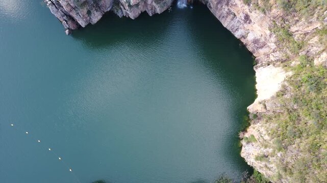 Aerial views of the Capit&oacute;lio Canyons in Minas Gerais, Brazil, showcasing dramatic rock cliffs, emerald waters of Furnas Lake, breathtaking landscapes, and one of the country's most iconic natural att