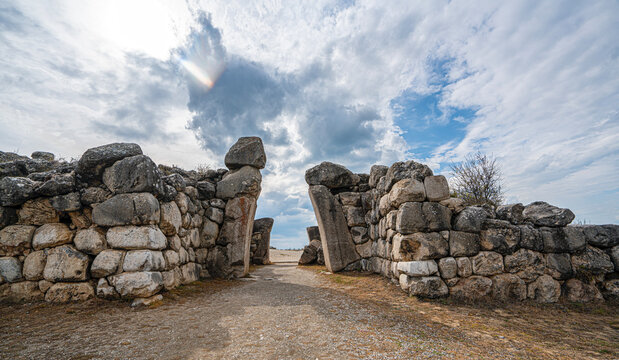 Architectural view of the famous stone-carved King's Gate at the ancient ruins of Hattusa. The monumental gate represents the master masonry and artistic achievements of the Hittite civilization in An