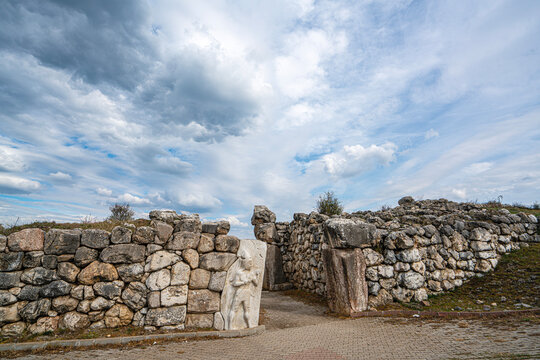 Architectural view of the famous stone-carved King's Gate at the ancient ruins of Hattusa. The monumental gate represents the master masonry and artistic achievements of the Hittite civilization in An