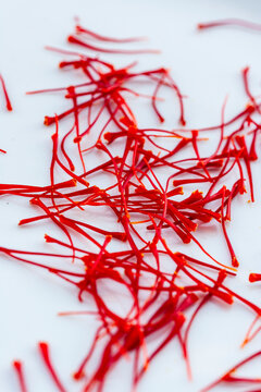 Red saffron spice from Mund Switzerland on a white background