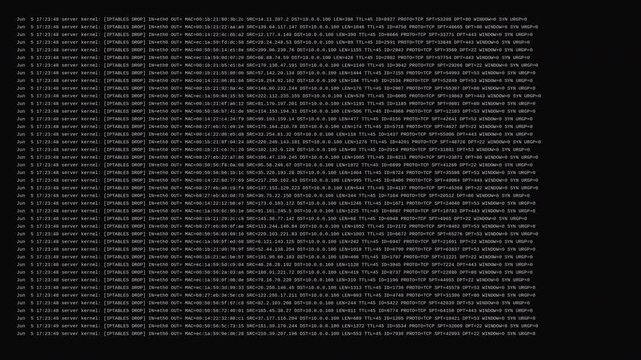 Volumetric DDoS Attack IPTables Syslog Flood Rapid Terminal Scrolling Firewall Denying IP Spoof Packets Cybersecurity Warning For Server Defense Information Technology And Infrastructure Protection