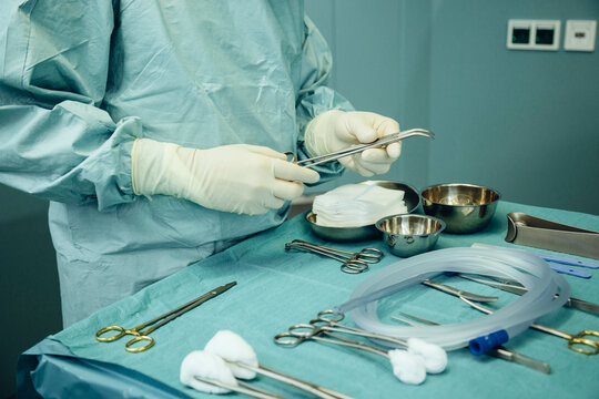 Surgical instruments being laid out on a table in operating room
