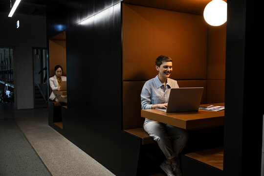 People working in modern coworking office with technology and teamwork