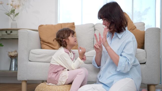 Teacher guiding a young girl in art activity, enhancing creativity and concentration	