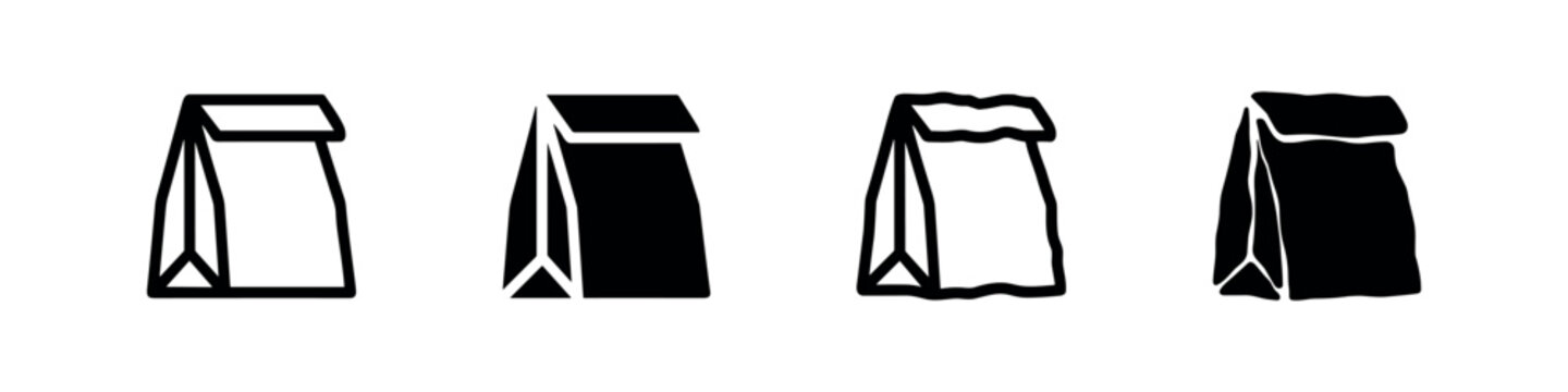 Set of four stylized black and white paper bag icons, abstract packaging
