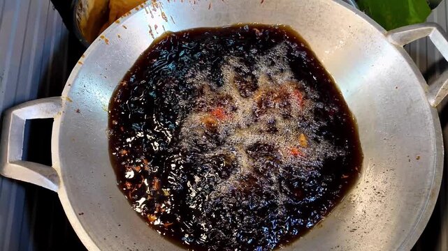 Deep Frying Chicken in Boiling Oil at Thai Street Food Market