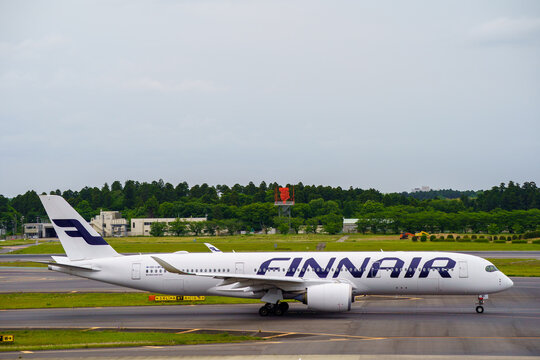 Narita, Chiba Japan - 2021 May 11: A Finnair Airbus A350-900 passenger aircraft with registration OH-LWK taxiing on the taxiway at Narita International Airport.