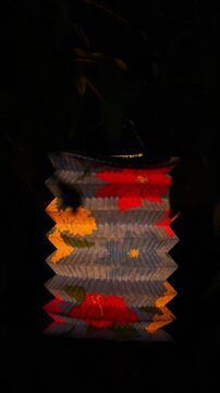 close up of colorful vesak lanterns illuminated at night