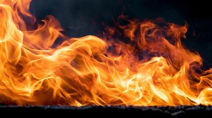 Fototapeta premium Close up shot capturing intense flames and glowing heat, displaying vibrant orange red energy and texture that depict strong, volatile combustion and dynamic movement