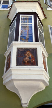 Historic facade of a building in the medieval center of Chiusa, in South Tyrol, characterized by a characteristic bay window (Erker) South Tyrol Italy