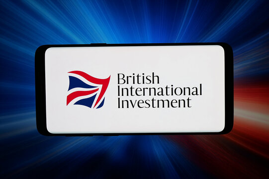Stuttgart, Germany - 05-20-2026: In this photo illustration, the logo of British International Investment plc (BII) is displayed on a smartphone in front of abstract background on computer screen.