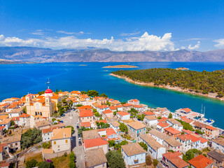 Scenic aerial view of Galaxidi village with colorful buildings, Greece © gatsi