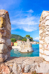 View of the port of Nafpaktos, Lepanto with the fortress and the entrance of the old Venetian harbor, Greece  © gatsi