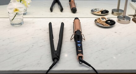 Professional Hair Styling Tools Flat Iron and Curling Wand on Countertop.