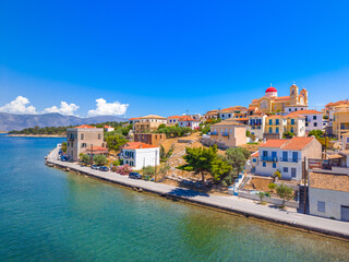 Scenic aerial view of Galaxidi village with colorful buildings, Greece © gatsi