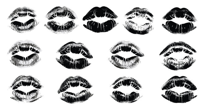Collection of diverse black lipstick kiss marks and lip prints on a white background showcasing various shapes and texture details.
