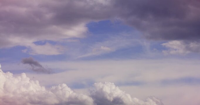 Dramatic cloudy sky with a soft opening of blue light