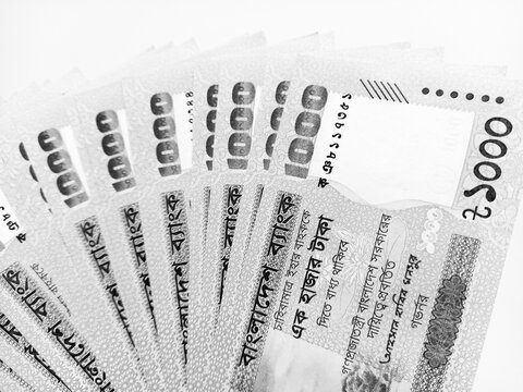 Bangladeshi banknotes 1000 taka held by a gloved hand. Money of Bangladesh.