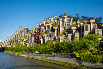 Futuristic 1000 Trees Building with Green Planters and Terraced Architecture on Suzhou Creek in Shanghai, China. © Plamen Petrov