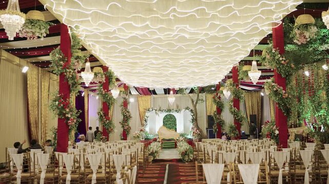 Cinematic Zoom-in Shot of Grand Wedding Mandap and Banquet Seating Arrangement