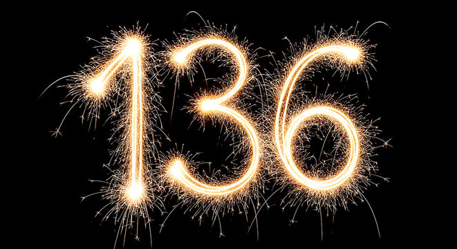 Vibrant fireworks forming the number 136 against a dark backdrop, creating a celebratory visual effect.