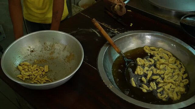 Fafda a crispy Gujarati snack made from gram flour and often served with chutney