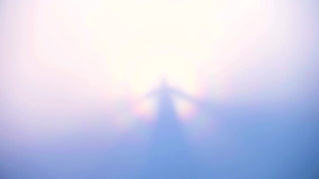 Ethereal silhouette of a person with outstretched arms emerging from a bright, hazy light, creating a mystical and spiritual atmosphere, symbolizing hope, freedom, and transcendence.